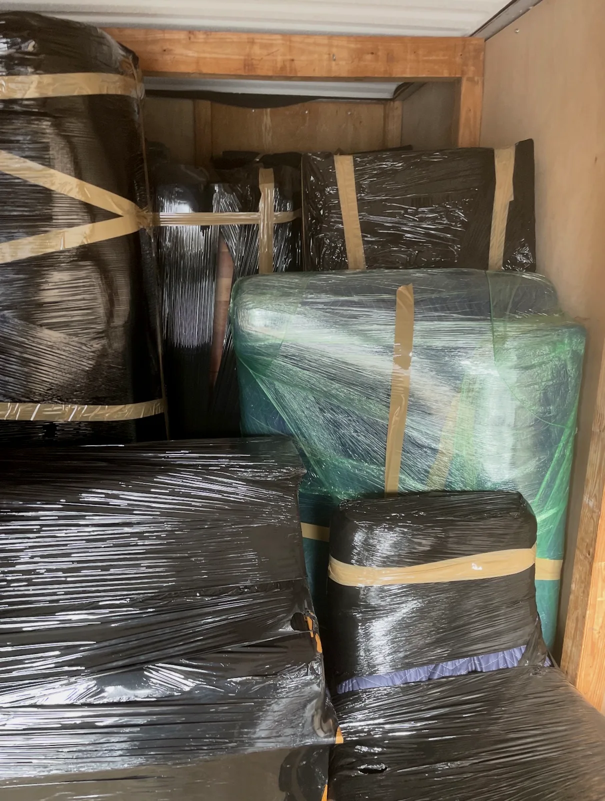 Furniture wrapped and protected before a Portland move